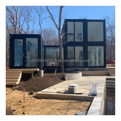 Hotel Luxury Portable Flat Roof Container Prefab Studio Home House with 50/75/100mm Wave Sandwich Panel Wall and Affordable
