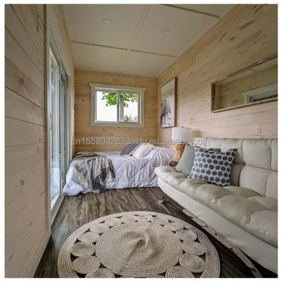 Hotel Luxury Portable Flat Roof Container Prefab Studio Home House with 50/75/100mm Wave Sandwich Panel Wall and Affordable