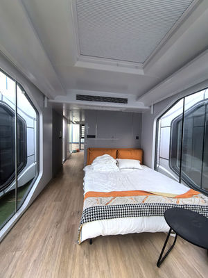 Customized Color Soundproof Space Capsule Prefab Tiny House with Wall 50/75/100mm Wave Sandwich Panel